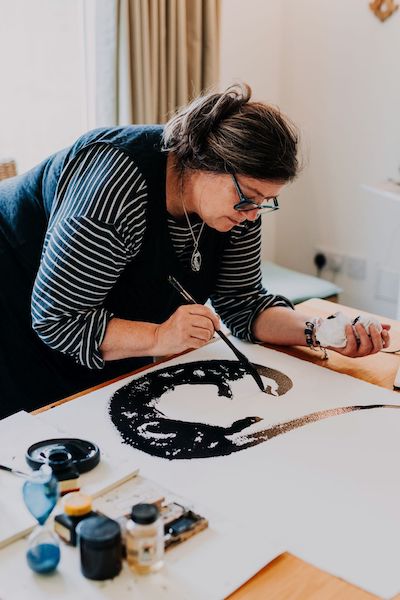 Jackie Morris inking Otters at the Spell Songs first gathering, Greta Hall, Lakes, September 2018